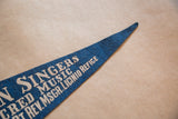 Vintage blue felt pennant tip showing white 'MSGR.LICINIO REFICE' lettering.
