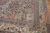 Late 19th century Kermanshah carpet, intricate borders, scrolling floral field, wear to knot heads.