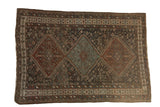 Antique Kamseh carpet featuring triple diamond medallions and intricate field designs. 6'1