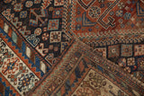 Antique Kamseh rug's folded corner reveals the intricate hand-knotted weave and foundation.