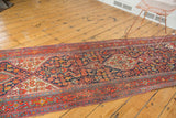 Vintage Bibikabad runner section with navy, brick red multi-medallion Herati patterns.