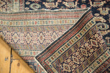 Finely woven Kufic and geometric borders on the reverse of an antique Shirvan rug.