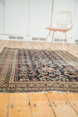 Unusually fine weave of antique Shirvan rug, displaying perepedil motif, Kufic border, and historic wear.