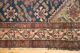 Vintage Hamadan runner's ivory and madder red geometric border with natural fringe.