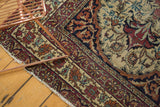 Antique Kermanshah rug corner, classic Safavid inspired scrolling borders, cochineal red and ivory field.