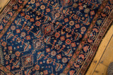 Vintage Engelas rug's Herati motif with bird and serpent designs in indigo, terra cotta, and ivory.