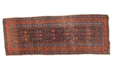 Antique Kurdish Bijar runner, allover tribal floral motifs in deep navy and orange-red, circa 1920s.