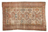 Antique Caucasian Perpedil rug with ivory ground, geometric rams horn motifs, and Kufic border.