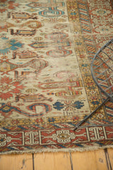 Antique Caucasian Perpedil rug showcasing geometric Kufic border, ivory rams horn motifs, and fringe.