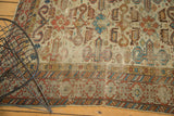 Antique Perpedil rug's ivory field, madder red Kufic border, and rams horn motifs.