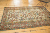 Antique Caucasian Perpedil rug upper corner, ivory ground, ram's horn motifs, Kufic border.
