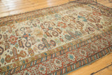 Antique Perpedil rug detail with geometric Kufic border, rams horn motifs, madder red, sky blue.