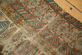 Intricate geometric Kufic border and visible hand-knotted texture on an antique Caucasian Perpedil rug.