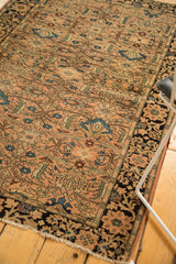 Antique Farahan Sarouk rug, dusty rose field, intricate tree of life, dark border, worn corner.