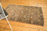 Antique Farahan Sarouk corner with navy floral border and dusty rose field, sky blue motifs.