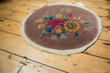 Antique Art Deco rug detail: colorful lotus floral design, plush pile, and plain weave edge.