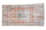 Distressed vintage Oushak rug with faded ruby grapefruit and roundel medallion, 2'7