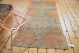 Distressed Oushak runner fragment with double shadow medallion in apricot and oxidized silver.