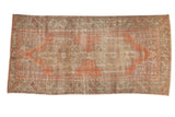 Distressed Oushak runner, double medallion, patterned spandrels in terracotta, sand, 4'2