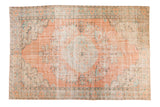 Distressed Oushak rug with peach field, central medallion, and faded floral patterns, 6'3