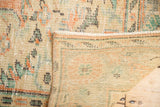 Distressed peach, mint, ivory Oushak rug pile with exposed foundation, hand-knotted reverse.