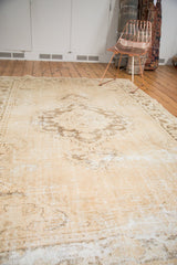 Vintage Distressed Oushak carpet surface with even wear, exposed foundation, and ivory-brown tones.