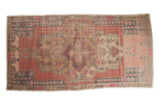 Vintage distressed Oushak rug, faded blush, antique ivory geometric medallion, 4'6