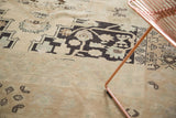 Distressed Oushak carpet with charcoal geometric pattern, pale pistachio, and abrashes.