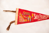 Red felt pennant left edge, showing brown felt ties and China Town graphic.