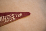 Worchester Mass. felt flag pennant with pale text on maroon felt, showing pointed end.