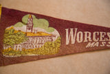 Textured maroon felt pennant with white 'Worcester Mass' lettering.