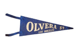 Olvera St. Los Angeles felt flag, deep blue with cream lettering, precisely cut ties.