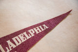 Maroon felt Philadelphia pennant tip, with white lettering and subtle creasing.