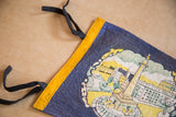Vintage Baltimore MD felt pennant with yellow band, black ties, and monument art.