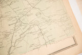 Decorative border detail with green hand-coloring on an antique 1860s Bedford atlas map.