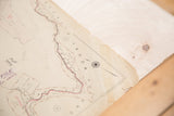Corner view of the vintage 1930s Hopkins map showing original creasing, tears, and tape.
