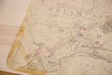 Close-up of vintage 1930s Hopkins map, lower right showing visible tape and aged paper.