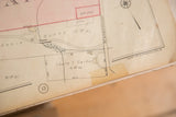 Detail of the 1930 Hopkins map showing copyright, compass rose, and aged paper edge.