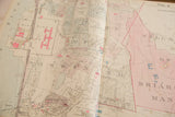 Detailed section of the 1930s Hopkins map, showing Liberty Street, green parcels, and property outlines.