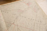 Close-up of a vintage 1930s New Castle map detailing property lines and landowners.