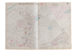 Vintage Hopkins map of the Village of Peekskill showing color-coded buildings and aged paper texture.