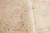 Intricate street grid with color-coded properties on the vintage Hopkins map of Peekskill.