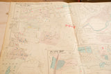 Close-up on the aged paper and detailed street layouts of a vintage Peekskill, NY map.