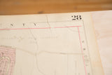 The aged paper and fine creasing on a corner of the vintage Hopkins map.