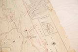 Close-up of the 1930s Hopkins map section, showing Pines Bridge Road and aged torn edge.