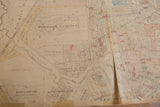 Aged vintage Hopkins Mt Kisco map featuring a prominent central rip and paper creases.