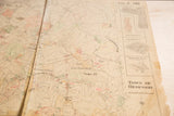 Vintage Hopkins Town of Bedford map detail, showing central rip and aged paper.