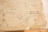 Top right detail of the vintage Hopkins Bedford map showing title, corner rip, and old tape.