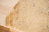 Aged vintage map of Bedford, New York, showing a torn edge and repair tape.