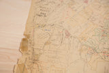 Torn, discolored left edge of the vintage 1930s Hopkins map of Bedford, NY.